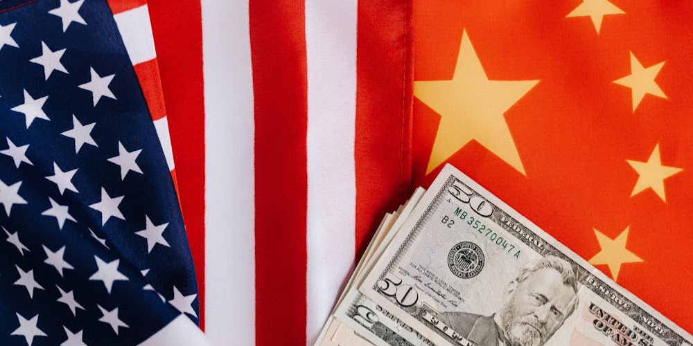 Minister Wang Wentao Addresses Chinese Enterprises in US Amidst Complex Trade Dynamics